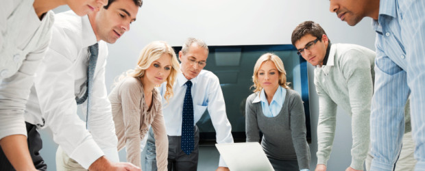 A large serious group of successful business team standing on a meeting in the office and looking at reports.  

[url=http://www.istockphoto.com/search/lightbox/9786622][img]http://dl.dropbox.com/u/40117171/business.jpg[/img][/url]